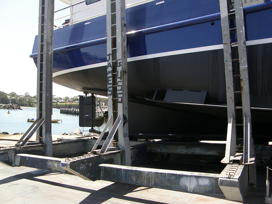 Commercial fishing vessel, painting of bottom , boot line and blue up to the sponson.